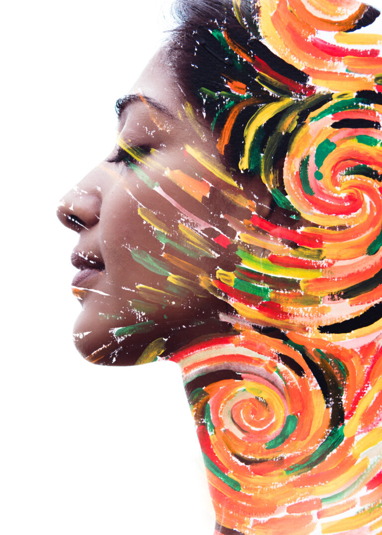 Paintography. Double exposure portrait of a beautiful pensive exotic woman combined with impressionistic style flowing brush strokes which explode with color and life